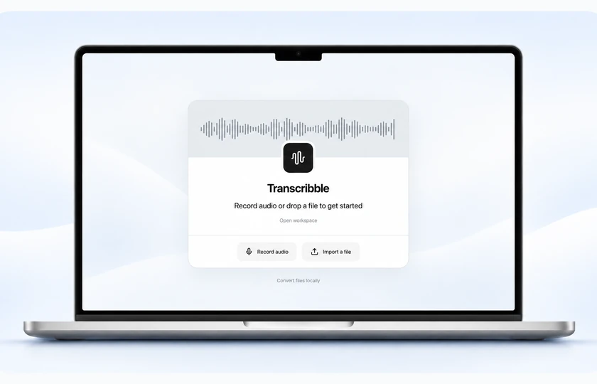 Transcribble start screen on a laptop showing the waveform branding and Record audio and Import a file actions.